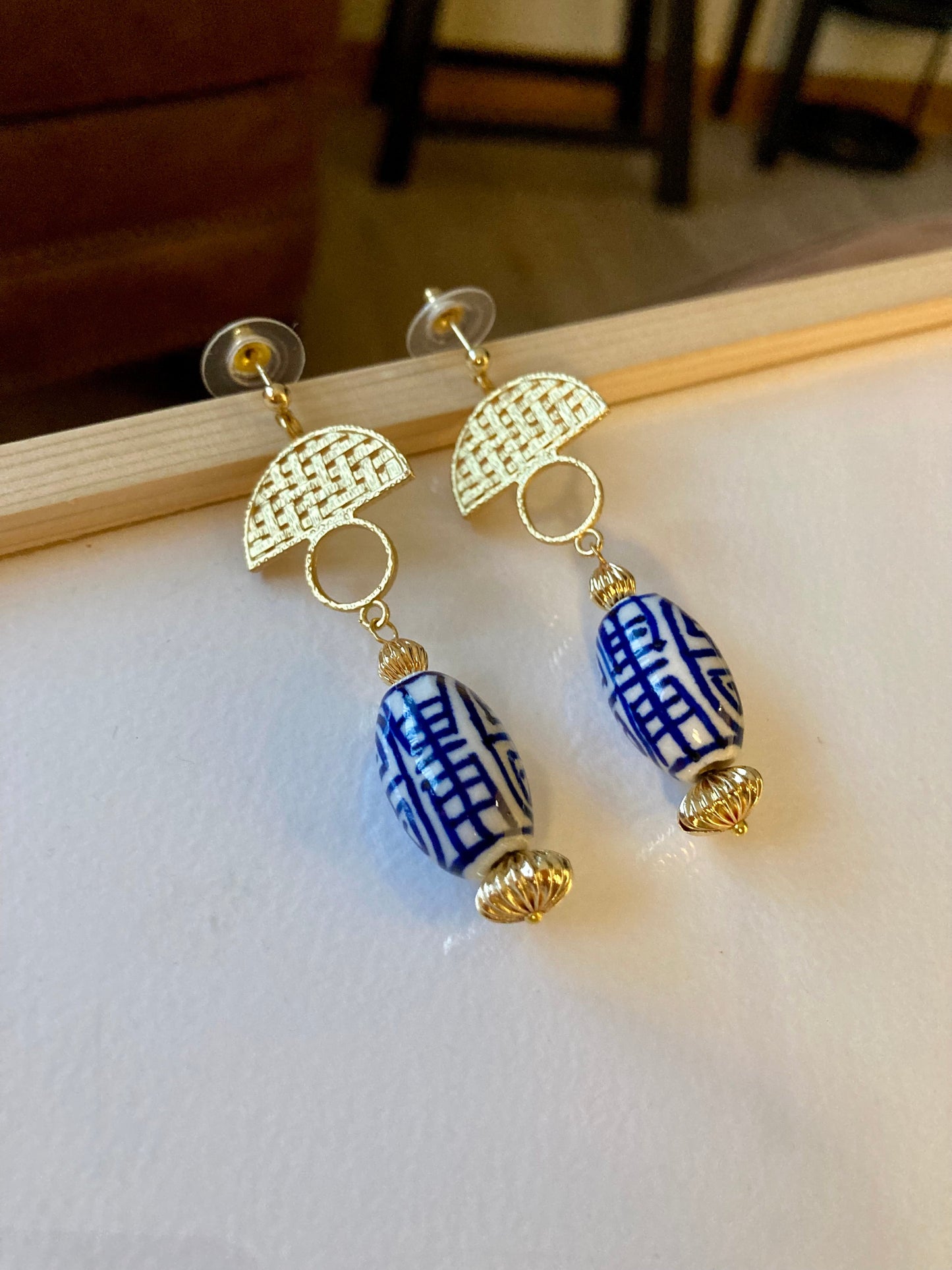 Esperanza• Modern Design Golden Huggies Earrings with Hand Painted Ancient Character of Long-Life Ceramic Beads